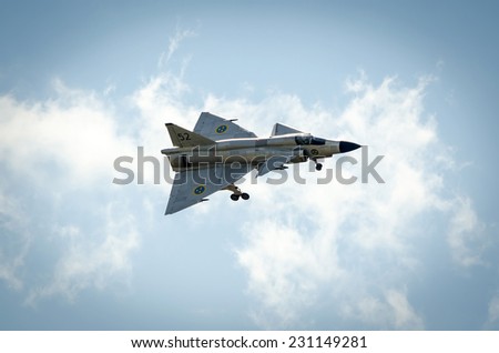 KALLINGE, SWEDEN - JUNE 01, 2014: Swedish Air Force air show 2014 at F 17 Wing in flight with open chassis.