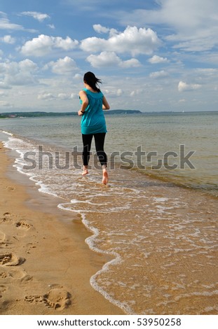 Beach running lady