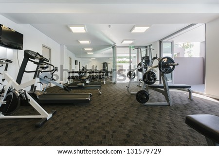 Modern gym interior with equipment Modern gym interior with equipment