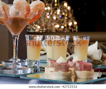 Asian Fusion appetizers with prawn cocktails, tuna, peking duck spring rolls and soups.