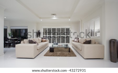 Dining Room on Luxury Home Living Room Interior Overlooking Dining Room Stock Photo