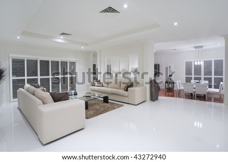 Dining Room on Luxurious Living Rooms With Dining Table In The Background Stock Photo