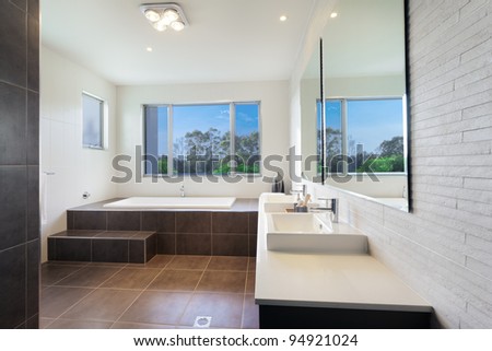 Modern Twin Bathroom With Stylish Bath Stock Photo 94921024 ...
