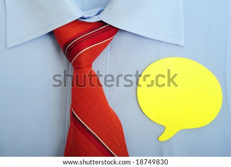 Close up of a shirt with yellow notes