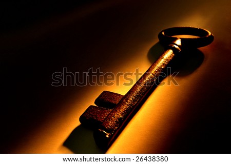 Close up of an old key in golden light