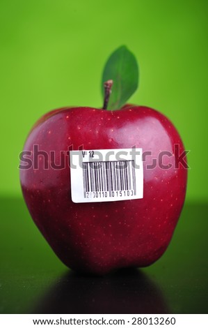 Close up of red apple with barcode label