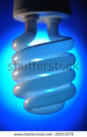 Brighten spiral light bulb on blue spot light