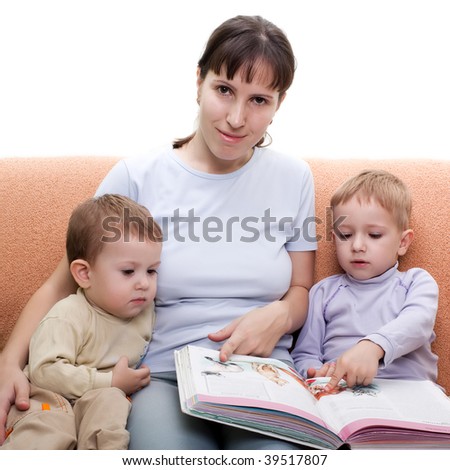 Little child and mother parent reading family book