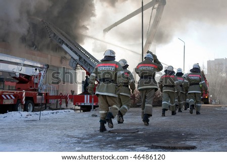 Burning fire, smoke, firefighters' emergency service
