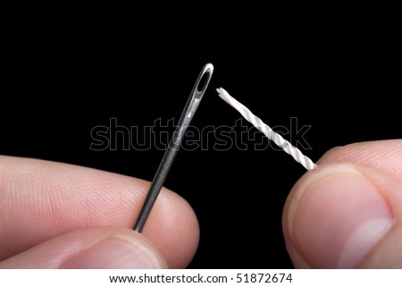 Sewing craft needle textile thread in human finger