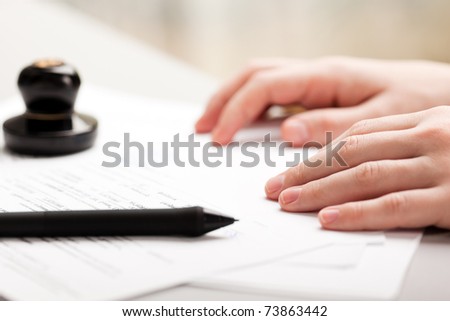 Human business men hand pen writing paper document