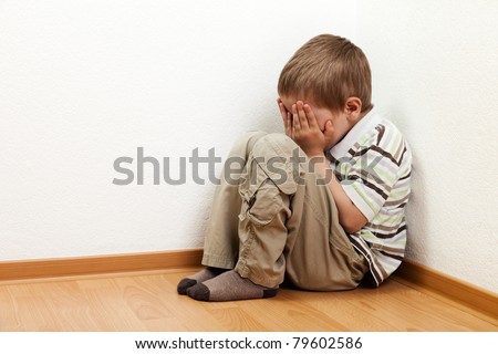 Little child boy wall corner punishment standing Little child boy wall corner punishment standing
