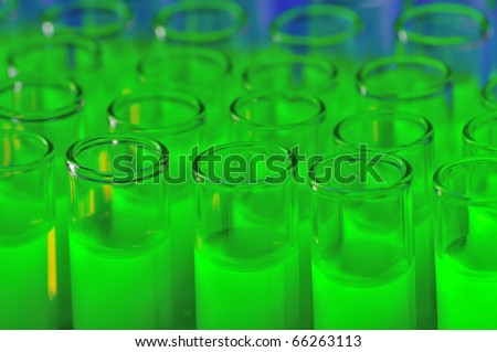 Test tubes with fluorescent liquid
