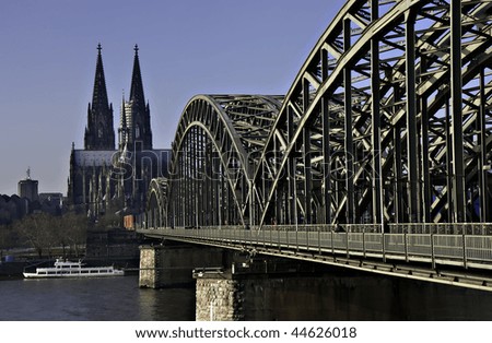 Cathedral of Cologne with iron arcs of Hohenzollern bridge, Cologne, Germany