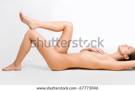 stock photo Perfect naked lady lying on the floor