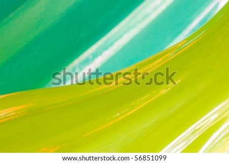 Green and yellow abstract of glass vases