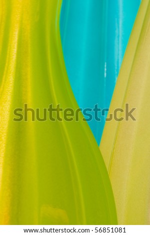 Blue, green and yellow abstract of glass vases