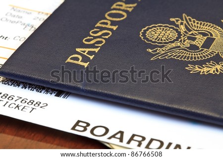 Macro shot of passport and boarding pass
