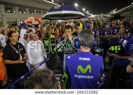 LOSAIL - QATAR, MARCH 29: Italian Yamaha rider Valentino Rossi on the grid at 2015 Commercial Bank MotoGP of Qatar at Losail circuit on March 29, 2015