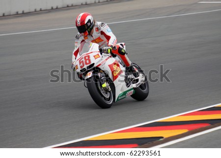 SACHSENRING, GERMANY - JULY 17: Italian rider Marco Simoncelli breaks hard during practice at Eni German Motorcycle Grand Prix 2010 on July 17, 2010 in Sachsenring, Germany