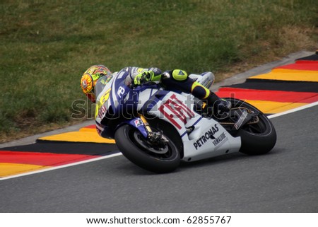 SACHSENRING, GERMANY - JULY 17: Italian rider Valentino Rossi pushes hard during practice at Eni German Motorcycle Grand Prix on July 17, 2010 in Sachsenring, Germany