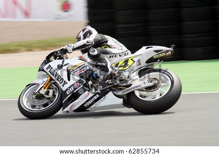 SACHSENRING, GERMANY - JULY 17: French rider Randy de Puniet pushes hard during practice at Eni German Motorcycle Grand Prix on July 17, 2010 in Sachsenring, Germany