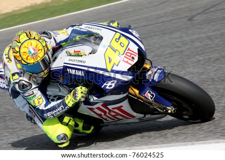 ESTORIL, PORTUGAL - OCTOBER 31: Italian Yamaha rider Valentino Rossi pushes hard during race at 2010 BetandWin Moto GP of Portugal on October 31, 2010 in Estoril.