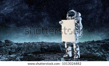 Spaceman with banner. Mixed media