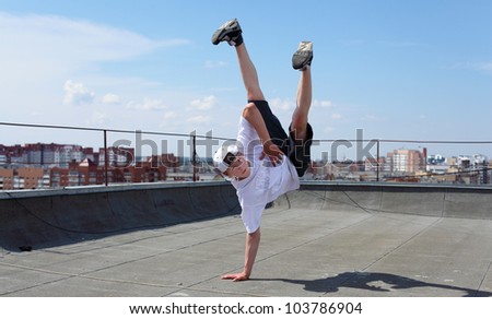 portrait of a young male street dancer outdoors