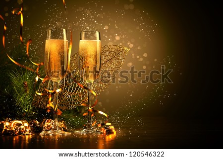 Two Champagne Glasses Ready To Bring In The New Year