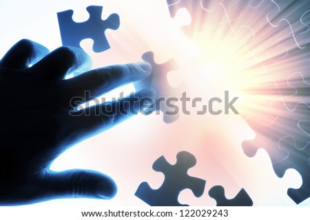 puzzle piece coming down into its place