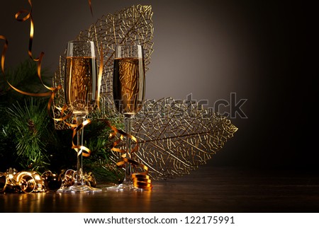 Two champagne glasses ready to bring in the New Year