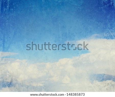 Old painting with cloudy blue sky as a background