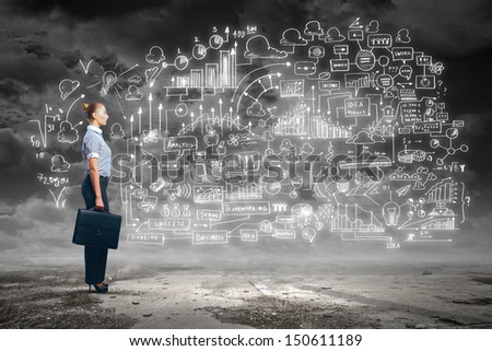 Side view image of businesswoman standing against business sketch