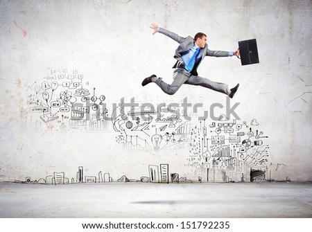 Image of businessman in jump against sketch background