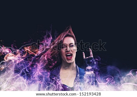Rock passionate girl with black wings and color background