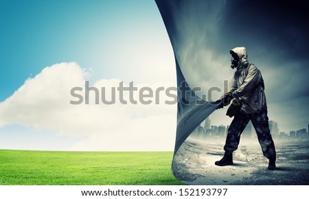 Image of man in gas mask turning page Ecology concept Image of man in gas mask turning page Ecology concept