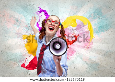 Funny looking woman speaking with a megaphone