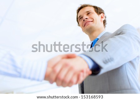 Close up image of business handshake at meeting. Partnership concept