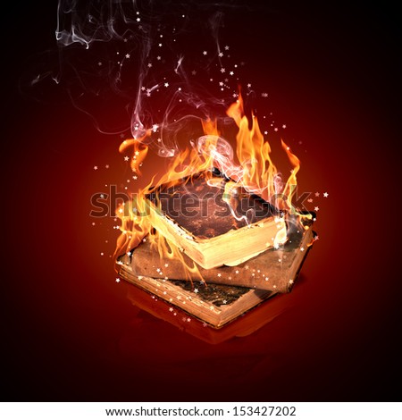 Image of magic book in flames of fire
