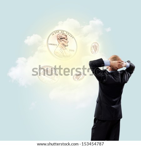 Image of thoughtful businessman standing with back