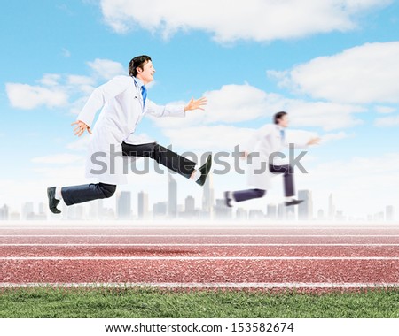 Funny image of young running doctor in white uniform