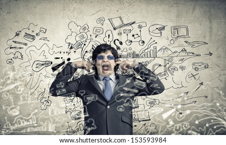 Image of businessman stopping his ears. Long working hours