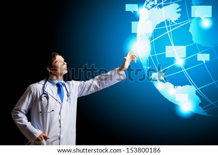 Image Of Young Doctor Touching Media Screen