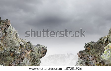 Gap between two rocks. Challenge and danger