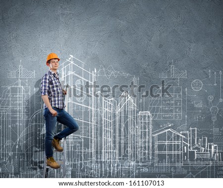 Image of man engineer against building project sketch