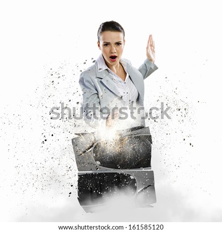 Image of young businesswoman damaging computer processor