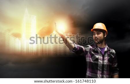 Image of man builder drawing project sketch