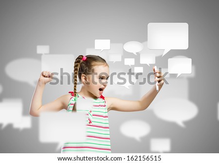 Image of little angry girl shouting in mobile phone