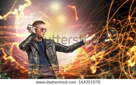 Image of young man rock musician at concert